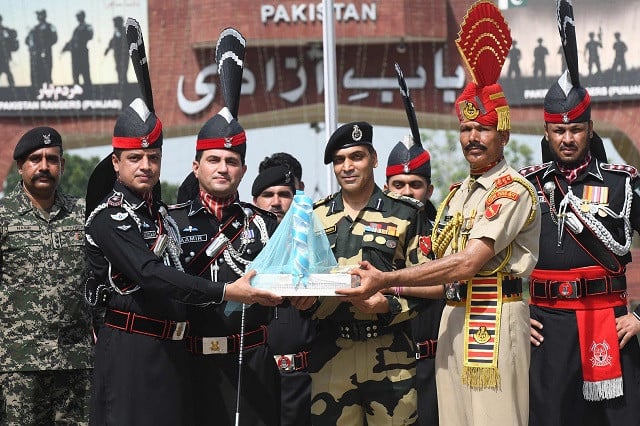 Pakistani and Indian Soldiers Exchange Sweets on Independence Day at Wagah Border